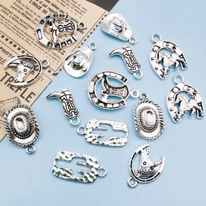 Retro silver cowboy themed alloy charms set featuring boots and hats on blue background