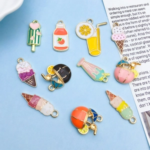 Macro shot of colorful summer themed oil-drop alloy charms for DIY jewelry making
