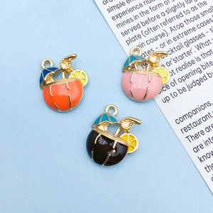 Detailed macro of colorful enamel fruit drink charms for DIY creative jewelry and hair clips