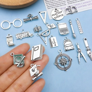 Antique silver graduation charms set with school bus and graduation cap pendants