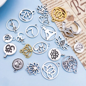 Set of yoga lotus pendants in antique silver and gold finish for DIY jewelry