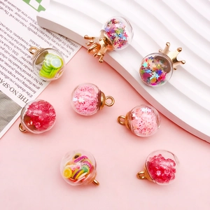 Creative DIY glass bottle pendants with colorful sequins and fruit slices for jewelry