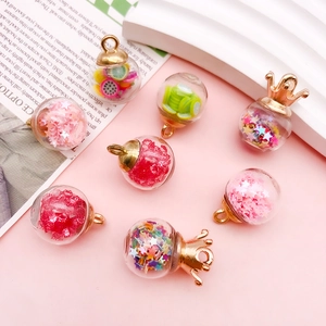 Creative glass bottle charms with colorful sequins and fruit slices for DIY jewelry