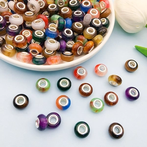 Macro shot of colorful resin cat-eye large hole beads for DIY jewelry making