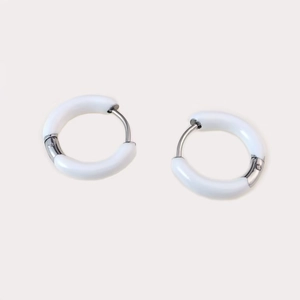 Minimalist geometric hoop earrings with white enamel finish and silver metal accents