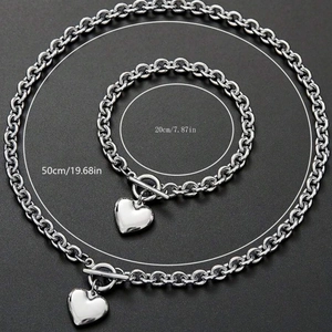 Ensemble collier et bracelet en acier argenté avec pendentif cœur et fermoir à bascule