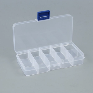 Detail view of 10-compartment transparent plastic storage box with blue buckle closure