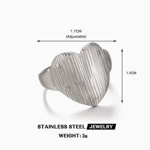 Adjustable stainless steel heart ring with vertical ribbed texture and silver finish