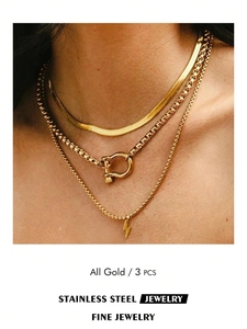 Three-piece gold-plated stainless steel layered necklace set with horseshoe and lightning charms