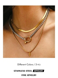 Three-layer stainless steel necklace set with snake chain, horseshoe buckle, and lightning bolt