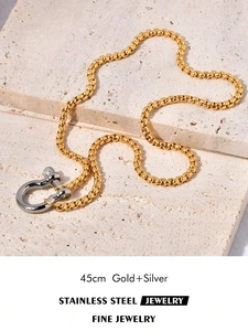 Detail of 45cm two-tone stainless steel chain with gold and silver carabiner clasp
