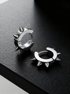 Détails de boucles d'oreilles punk en acier inoxydable avec des pointes de rivets