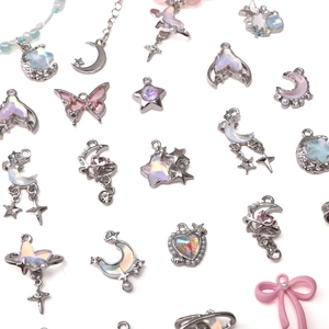 Assorted silver alloy charms including star, moon and butterfly for DIY jewelry making