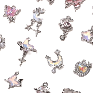 Silver alloy charms with star, butterfly, and moon shapes for DIY jewelry making and crafts