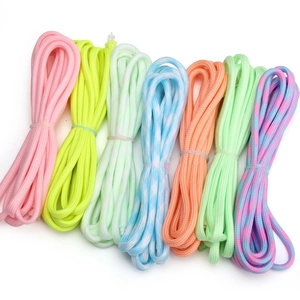 Detailed close-up of 7-core luminous paracord set in vibrant neon colors for DIY crafts