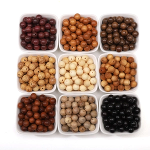 Detailed collection of nine distinct natural wood beads for DIY jewelry and bracelets