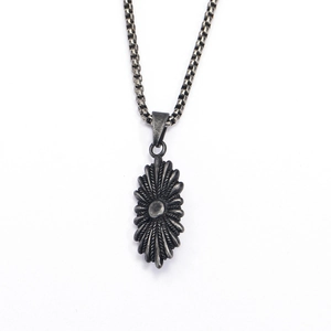 Vintage sunburst pendant necklace in aged steel finish with elegant box chain detail
