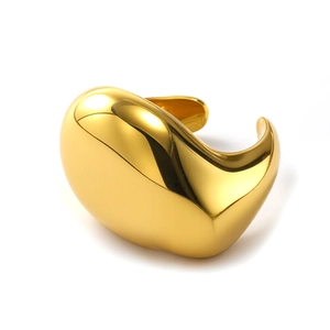 Polished gold organic streamline cuff bracelet with high-gloss finish and adjustable open design