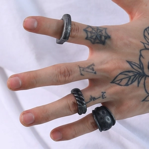 Three-piece set of vintage punk titanium steel rings with distressed geometric textures