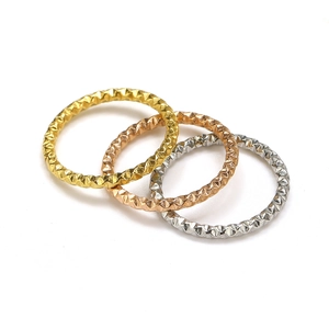 Three-piece diamond cut stainless steel rings set in gold rose gold and silver colors