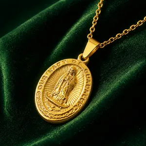 Gold oval Our Lady of Guadalupe medallion necklace in vintage relief style with O-chain