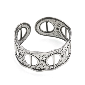 Vintage hollowed-out cuff bracelet in silver finish with a unique hammered texture design