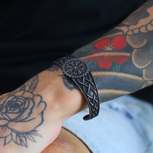 Close-up of Viking Vegvisir compass cuff bracelet with vintage textured metal detail