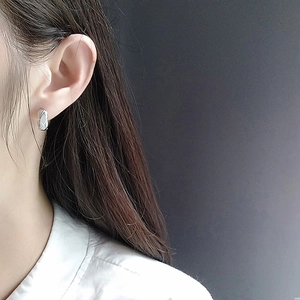 Elegant silver quilted pattern small hoop earrings for women in French vintage style