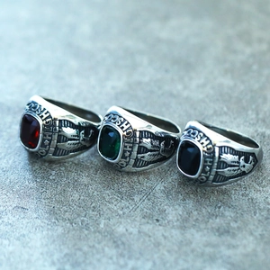 Vintage stainless steel eagle rings with red, green, and black square gemstones