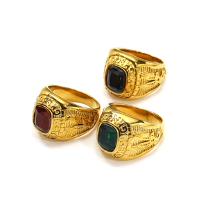 Vintage gold eagle ring set with red green black gemstones and champions engraving