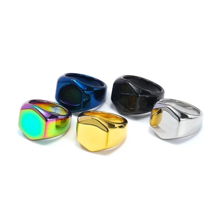Polished hexagon signet rings in rainbow, blue, black, gold and silver finishes