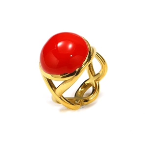 Detail of 18k gold plated ring featuring a large red cabochon stone and hollow band