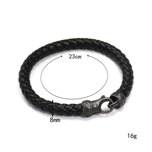 Bracelet tressé pour homme en cuir noir avec fermoir métallique gravé au style vintage