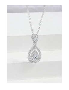 Detailed view of pear-cut diamond pendant with double waterdrop halo and silver chain