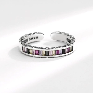 Adjustable S925 silver ring featuring colorful baguette-cut stones and vintage relief