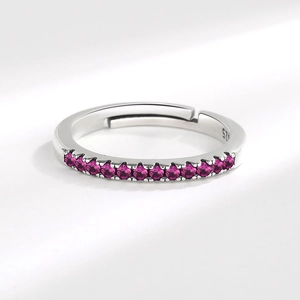 S925 sterling zilveren open ring met een rij levendige roze rond geslepen zirkonia's