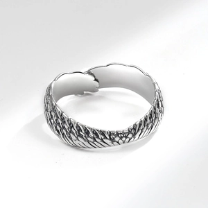 Minimalist silver angel wing feather open ring with detailed layered textures and wrap design