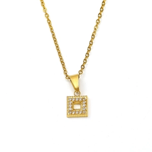 Macro detail of 18K gold plated square pendant with micro-pave white cubic zirconia stones