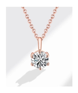 Vue détaillée du pendentif classique en moissanite à six griffes en or rose poli