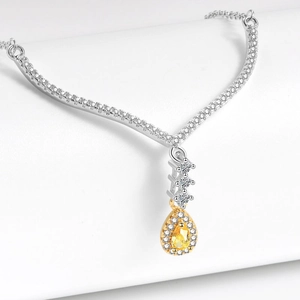 Elegant pear-cut yellow diamond pendant necklace with two-tone silver and gold setting