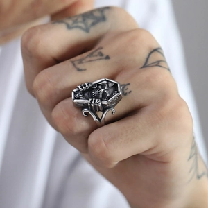 Vintage punk skull in coffin ring made of distressed titanium steel for men