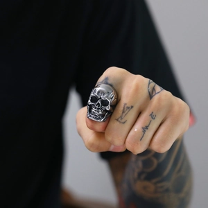 Men's punk hip-hop 3D skull ring in vintage silver steel shown on hand