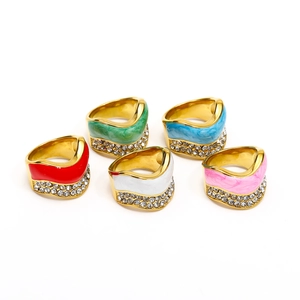 5-piece gold stackable ring set with colorful enamel wave bands and double-row crystals