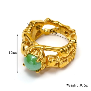 Vintage punk skull ring in 18k gold finish with round green gemstone and 23mm inner diameter