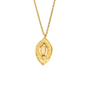Detail of vintage gold plated stainless steel necklace with oval natural stone pendant