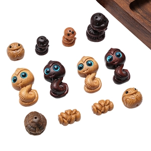 Handcrafted carved wooden snake beads for DIY jewelry making in various natural wood tones