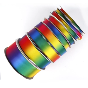Rainbow gradient polyester ribbon rolls in various widths for gift wrapping and DIY crafts