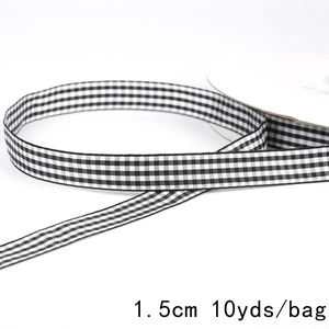 Detailed close-up of 1.5cm black and white gingham plaid ribbon, 10 yards pack