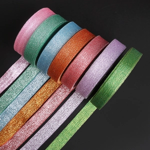 Macro detail of multi-color glitter ribbons for Christmas gift and flower packaging