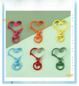Detailed view of colorful heart-shaped alloy lobster clasps for DIY jewelry making